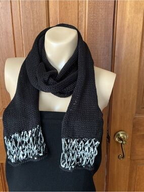 Fashion Bug Black Knit Scarf with white, Silver netting and sequin ends.